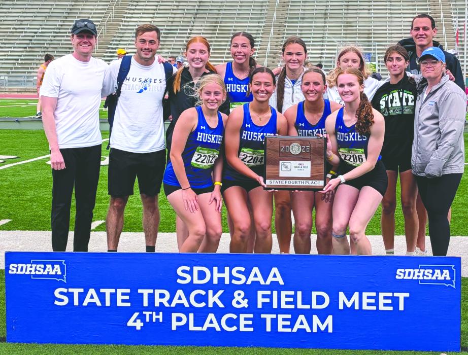 The EPJ girls track and field team placed 4th overall in Class A at the state meet held May 28–30, 2026. Back row, from left: Trey Ferguson, Max Cooper, Kate Hayes, Hailey Schmitz, Larissa Johnson, Jada Vande Vegte, Gracelynn Campbell, Tyler Goehring and Alicia Loiland. Front row, from left: Makinnley Hammit, Paige Jacobs, Cera Schmitz and Lauren McDermott. Photo by Kelly Riibe • times2reporter@gmail.com