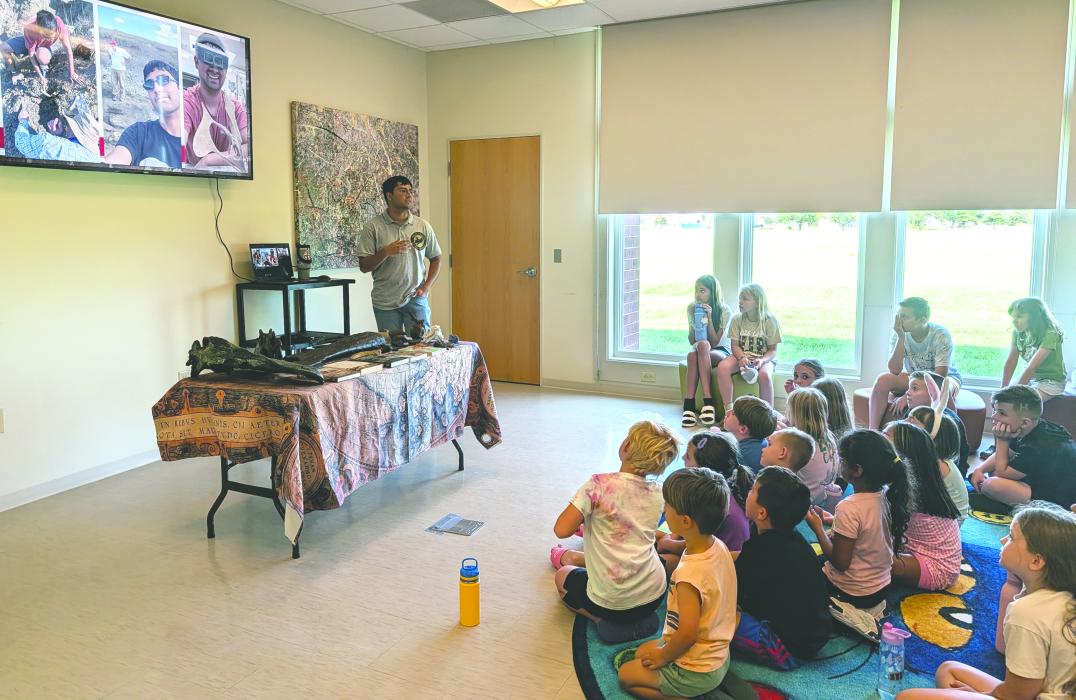 Brian Fernando, a paleo educator and field paleontologist, gave a presentation titled “Digging Into the Past” at the NSC Library on June 30, 2026. Photo by Kelly Riibe • times2reporter@gmail.com
