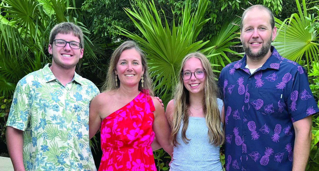 Newly appointed Dakota Valley High School Principal Jeff Hamm, right, poses for a photo with his family, from left, son Ethan Hamm, wife Jesica Hamm, and daughter Elizabeth Hamm. Jeff Hamm officially assumed the high school principal role on July 1, marking his 20th year with the district. Submitted photo