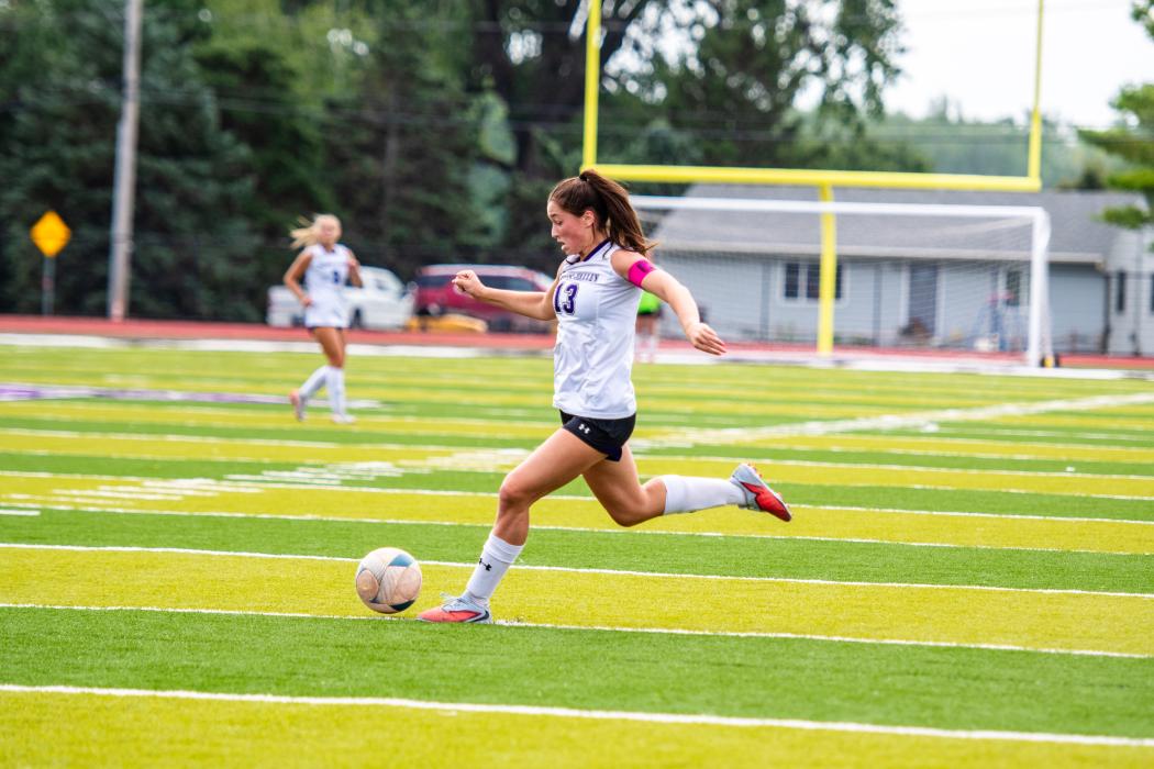 Julia Bernard, a Panther junior, sent a shot to the midfield to protect her team’s backline during the match versus Belle Fourche Photo by Peterman Sports Photography • stevepeterman5@gmail.com
