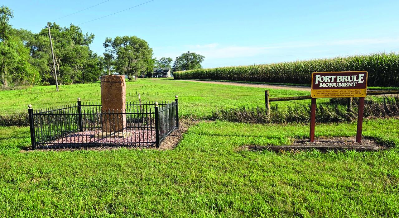 The restored Fort Brule monument stands along South Dakota Highway 50 after volunteer Larry Wilcox cleaned the granite marker, repainted the fence and refreshed the site’s signage. The landmark commemorates the 1862 frontier stockade built near Brule Creek. Photo by Shannon Jost • timesleader1@gmail.com