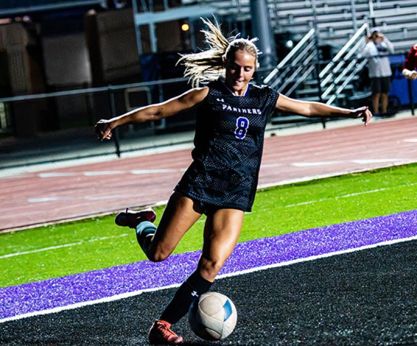 Ava Squier powers the ball up the field versus Garretson in the Panther’s 1st match of the 2026 playoffs. Photo by Peterman Sports Photography • stevepeterman5@gmail.com