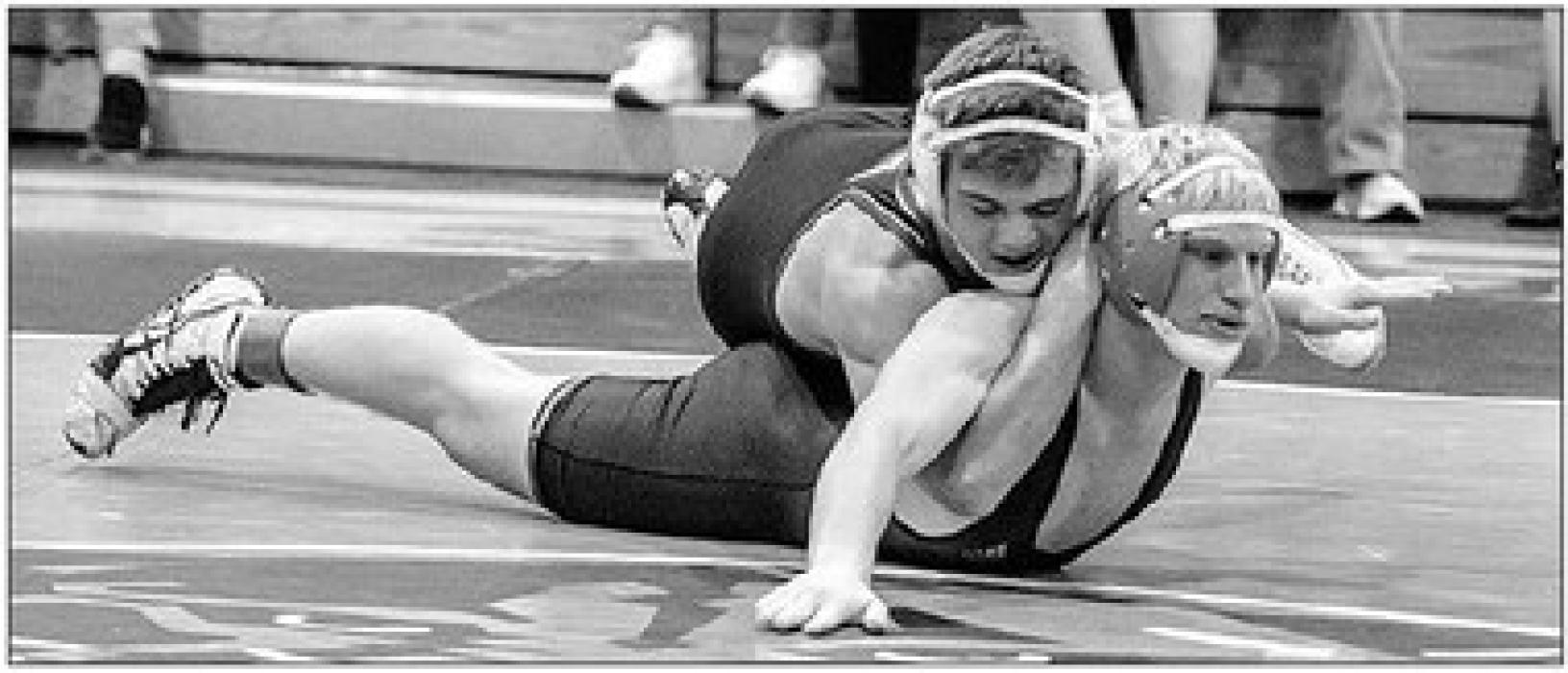 Lucus Hueser makes a move on Karsten Hamilton of Howard Feb. 18.