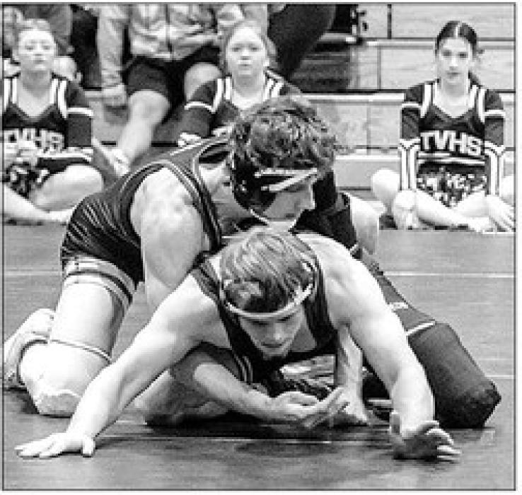 Gavin Jacobs wrestles Mason Henrickson of Tri-Valley at the Region 2B meet in Salem Feb. 18.