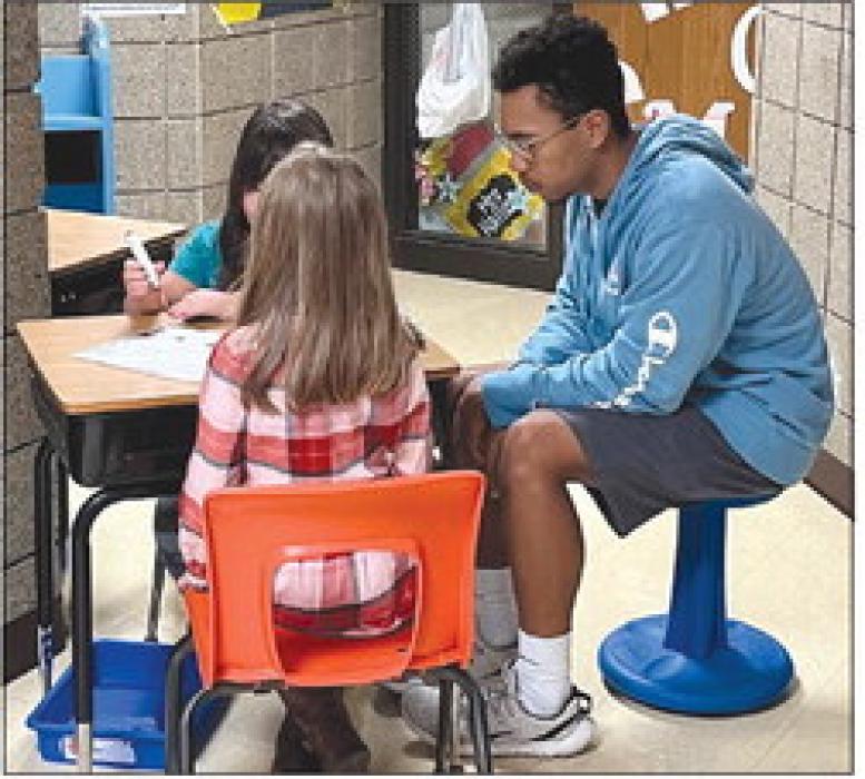 Roosevelt High School senior Dashawn Sykes works with Oscar Howe Elementary students as part of hisTeacher Pathway training in Sioux Falls. Sykes has plans to become a math teacher. Photo courtesy of Sioux Falls School District Photo courtesy of Jill Meier, Brandon Valley Journal