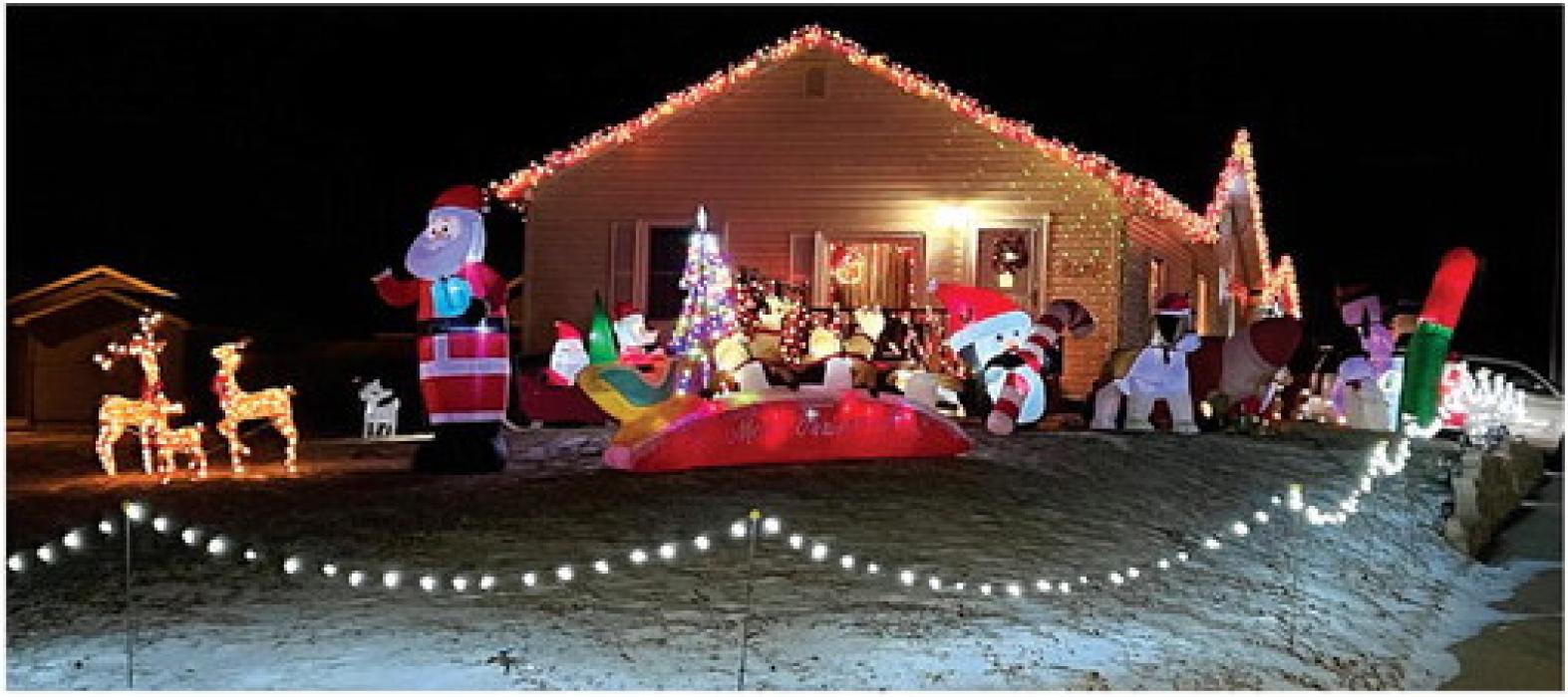 The Christmas Lighting Contest through the North Sioux City Parks and Recreation resulted in Tanner and Courtney Rasmussen at 201 Merrill Ave being awarded the Griswold Award.