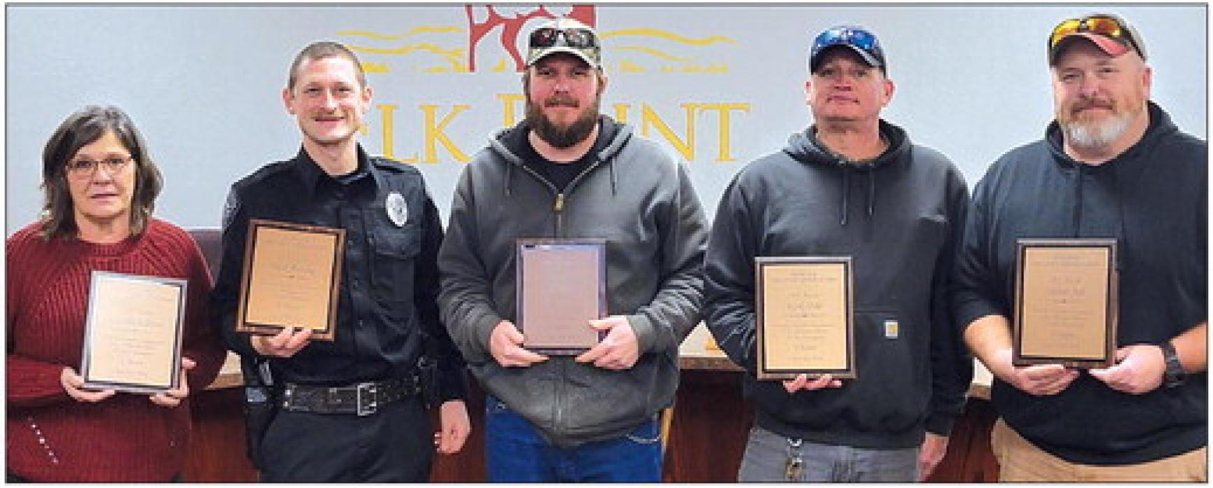 City of Elk Point employees who have been working with the city for five years are Justin Keegan (solo picture at top left) and (group picture, from left) Kim Hutcheson, Nick Fenske, Eric Haines, Kirk Pyle and Trevor Job. Submitted photos