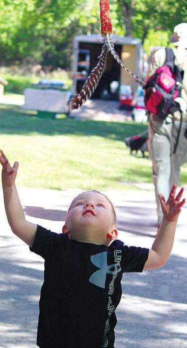 Brooks Custis tosses his turkey twirler into the air.