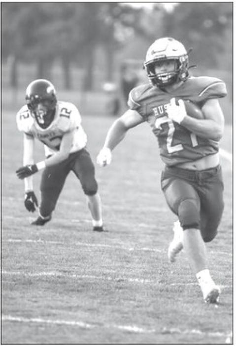 Ben Swatek breaks away the Rapid City Christian defense Oct. 22 for a rushing touchdown. Photo by Peterman Sports Photography stevepeterman5@gmail.com