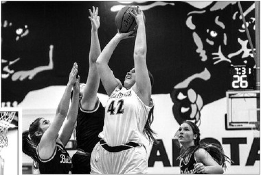 (Top) Ella Reifenrath grabs a rebound and tries for 2 points against Le Mars Dec. 17 (Left) Melina Snoozy makes a fast break for an easy lay-up Dec. 17. Photos by Peterman Sports Photography • stevepeterman5@gmail.com