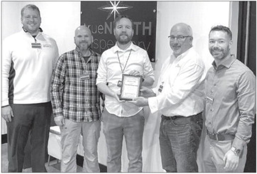 The North Sioux City Economic Development Corporation (NSCEDC) named True North Dispensary as the December Business of the Month. Pictured, from left, are NSCEDC Executive Director Andrew Nilges,NSCEDC Director John Stevens,True North Dispensary Partner Ben Nesselhuf, NSCEDC Board President Mike Huber and NSCEDC Director Dustin Pratt. Submitted photo