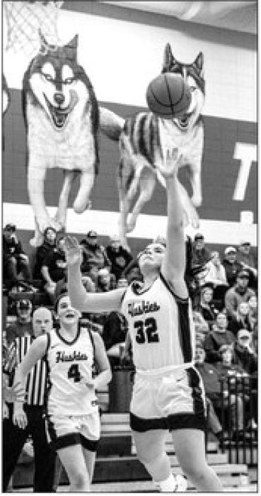 Courtney Brewer goes up for a lay-up. Photo by Peterman Sports Photography stevepeterman5@gmail.com
